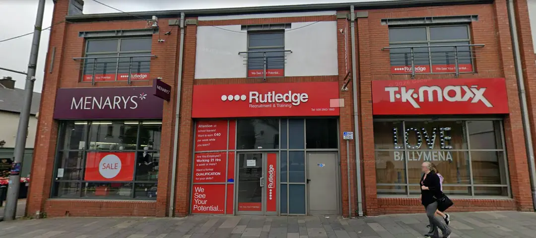Rutledge Recruitment & Training Ballymena branch on Thomas Street, red shopfront between Menarys and TK Maxx.